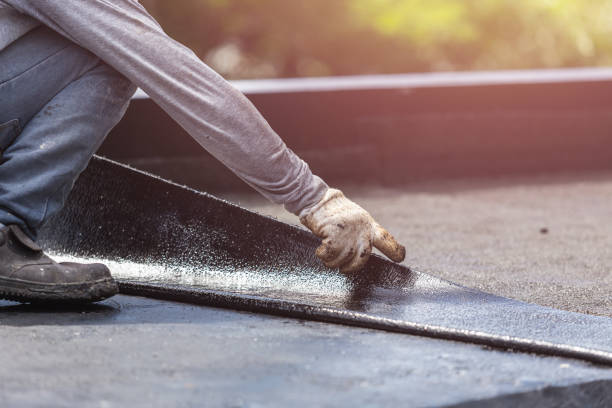 Professional Waterproofing technician working in Williamson, NY